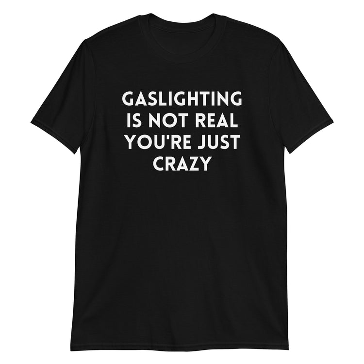 Black unisex t-shirt with "Gaslighting Is Not Real You're Just Crazy" graphic print, front view