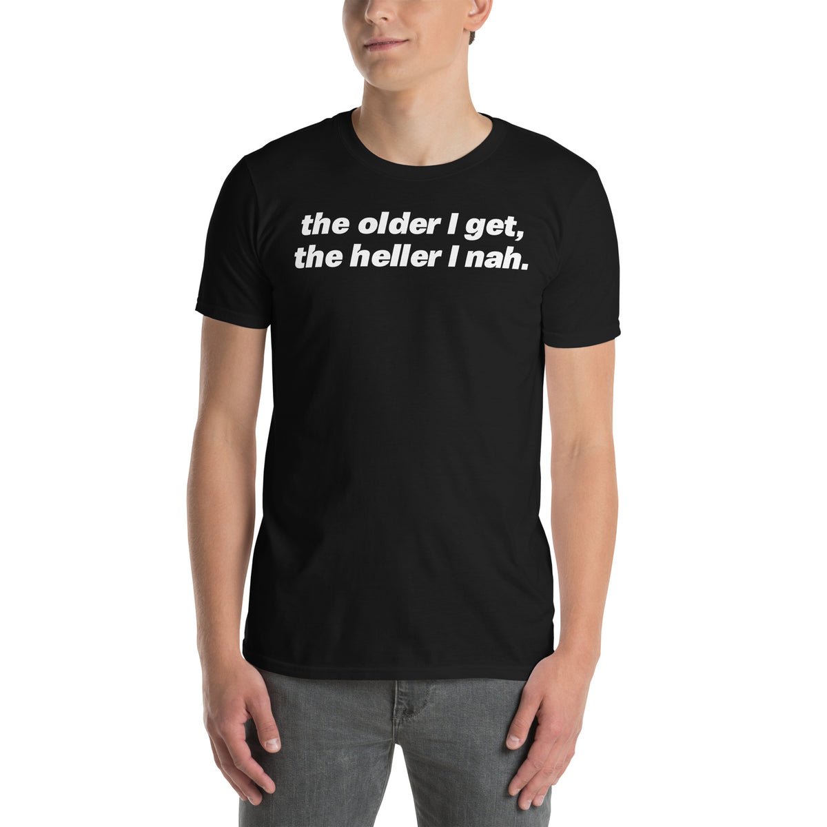 Black unisex t-shirt with "The Older I Get The Heller I Nah" graphic print, front view