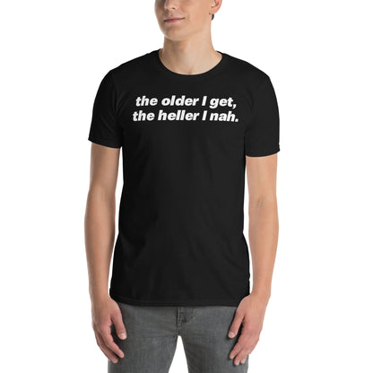 Black unisex t-shirt with "The Older I Get The Heller I Nah" graphic print, front view
