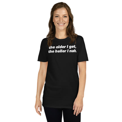Black unisex t-shirt with "The Older I Get The Heller I Nah" graphic print, front view
